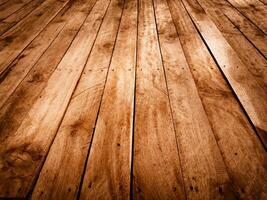 Close up of aged wooden planks with visible grain and nail heads viewed from a low angle photo