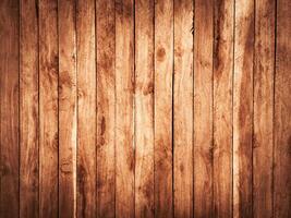 Rustic vertical wooden planks with visible grain patterns and knot details photo