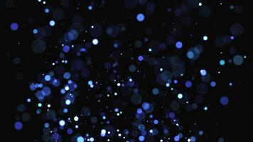 Abstract blue bokeh light particles floating on a dark background, creating a soft, elegant, and dreamy motion perfect for winter, night sky, festive, or relaxation projects. Seamless loop video