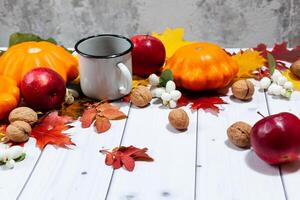 Autumn perspective background with pumpkins,apples and tea photo