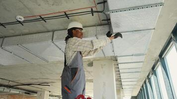 Electrician installing cables and wires in a building video