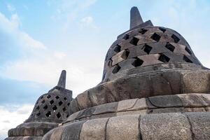 Detailed Close Up of Stone Stupa Structures at Borobudur Temple photo