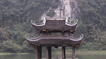 Time-lapse of a pagoda on a calm lake video