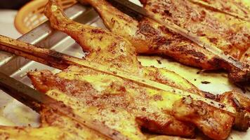 Delicious grilled chicken at a floating market video