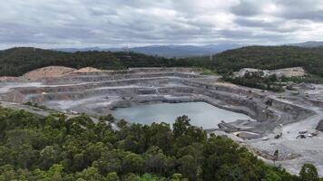 Drone captures quarry amidst lush greenery video