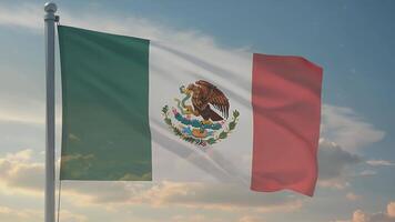 Mexico flag waving on a flagpole with a bright sky video