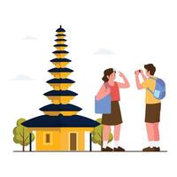 Tourists explore and take photos in front of a traditional Balinese temple. vector