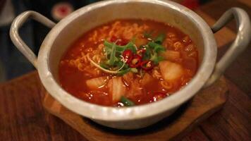 Cooking and serving spicy Korean ramyeon noodles video