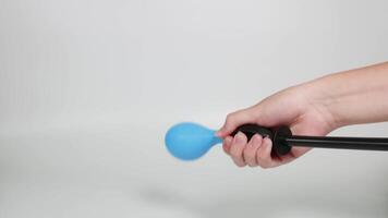 A balloon is inflated and then bursts dramatically video