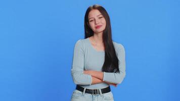 Yes, good idea. Caucasian young woman greatly approves your suggestion, shaking head approval, satisfied with good quality work, like proposal, feedback. Teenager girl isolated on blue background video