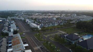 An aerial view of a residential area at sunset photo