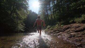 Man Running in a Forest River A Summer Adventure. Escape to nature, feel the refreshing water, and embrace the tranquility of a scenic journey through lush greenery and sunlight. photo