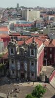 Aerial Church of Saint Ildefonso near Batalha Square in Oporto, Portugal video