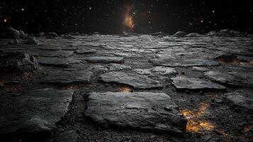 Mysterious rocky terrain illuminated by distant starry sky at twilight photo