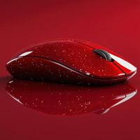 Elegant red mouse with sparkling finish on bright red reflective surface photo