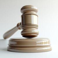 Gavel rests on wooden block in a serene courtroom environment during daytime photo