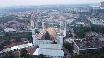 An aerial view of a mosque in a city photo