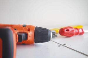 Tools arranged on a workbench for home improvement tasks photo