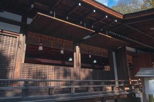 Ujikami Shrine, Uji, Kyoto, Japan, Traditional wooden architecture with intricate design elements. photo