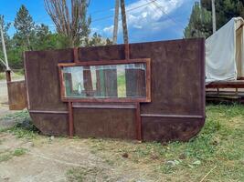 Rustic Wooden Structure with Window photo