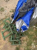 Disordered Umbrellas and Stands photo