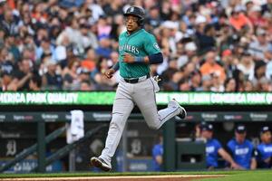 Seattle Mariners second baseman Jorge Polanco (7) scores a run against the Detroit Tigers in the second inning at Comerica Park. editorial_image