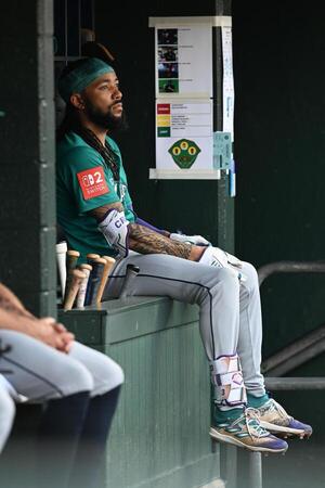 Seattle Mariners shortstop J.P. Crawford (3) watches the action against the Detroit Tigers from the bat well in the dugout in the second inning at Comerica Park. editorial_image