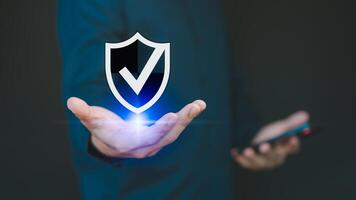 Displaying on a virtual screen, user showcases identity proofing icon for security protection, emphasizing the quality assurance of business services and certified guarantee approval for secure access photo