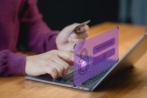 Customers purchase products online, pay securely via credit card, and are assured by the sign of a security protection system on the virtual screen. photo
