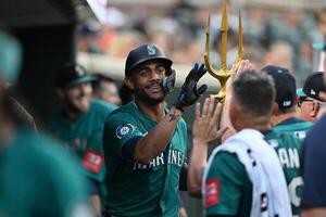 Seattle Mariners center fielder Julio Rodríguez (44) celebrates in the dugout after hitting a two-run home run off Detroit Tigers starting pitcher Tarik Skubal (not pictured) in the fifth inning at Comerica Park. editorial_image
