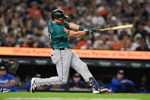 Seattle Mariners designated hitter Cal Raleigh (29) hits a grand slam home run against the Detroit Tigers in the ninth inning at Comerica Park. editorial_image
