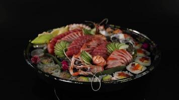 Various sushi pieces arranged on a rotating platter video