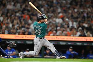 Seattle Mariners designated hitter Cal Raleigh (29) hits a grand slam home run against the Detroit Tigers in the ninth inning at Comerica Park. editorial_image