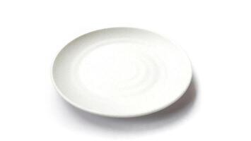 Empty circle white plate with ceramic melamin material isolated on white background photo