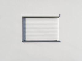 Closed White Window Shutter on Minimal Wall photo