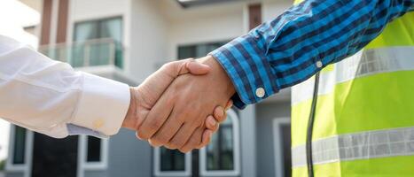team hand shaking greeting start up plan new project contract in office center at construction site, industry ,architecture, partner, teamwork, agreement, property, contacts photo