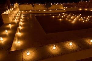 Illuminated Pathway Decorated with Candle Lanterns at Night photo