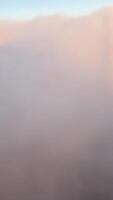 A serene aerial journey through clouds above Auckland, showcasing soft lighting and expansive sky views video