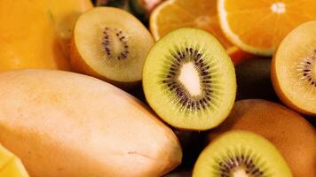Vibrant display of various sliced fruits video