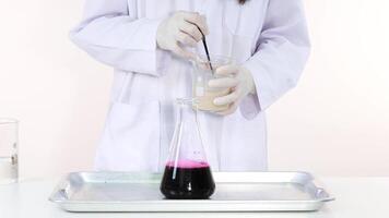 Mixing substances in a science experiment setup video