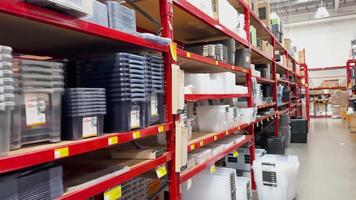 Walking through aisles of storage containers video