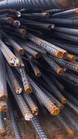 Close-Up of Rusty Steel Rebars at Construction Site photo
