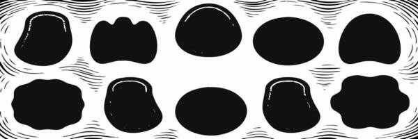 Collection of Hand Drawn Irregular Black Shapes on White Background vector