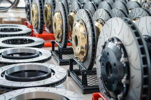 Brake rotors and pads in a factory photo