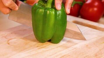 Slicing a green bell pepper with a knife video