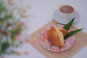 Cozy Breakfast with Cake and Hot Drink photo