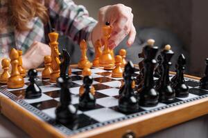 Chess Tournament Game in Progress with Female Player Strategizing Next Move photo