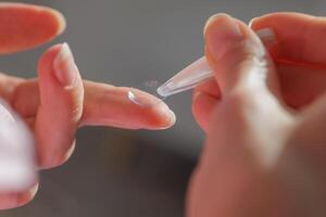 Applying Soft Contact Lens for Vision Correction and Refractive Error Solution Close Up photo