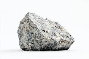 Close up view of a large gray and white rock stone with rough texture on a white background photo
