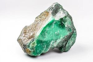 A close up shot of a rough green mineral specimen with rocky matrix on a white background photo